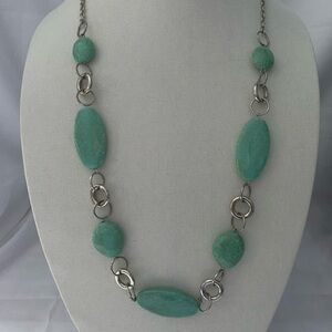 Faux Turquoise and silver fashion necklace.